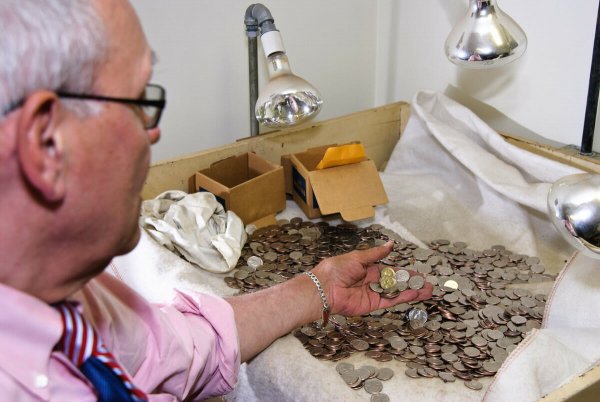 Rob Holsen inspects clean coins
