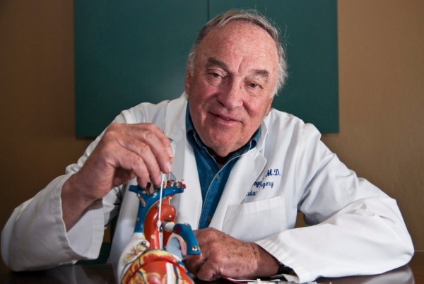 Dr. Thomas Fogarty, inventor of the stent, with a model of the human heart