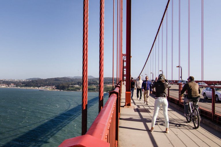 people on the Golden Gate Bridge, dramatic framing