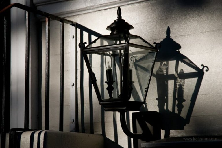 old lamp casting a stark shadow