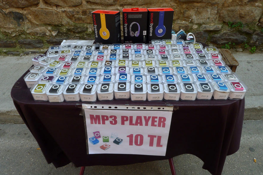 Table with knock-off iPods and name-brand headphones in Bursa, Turkey 